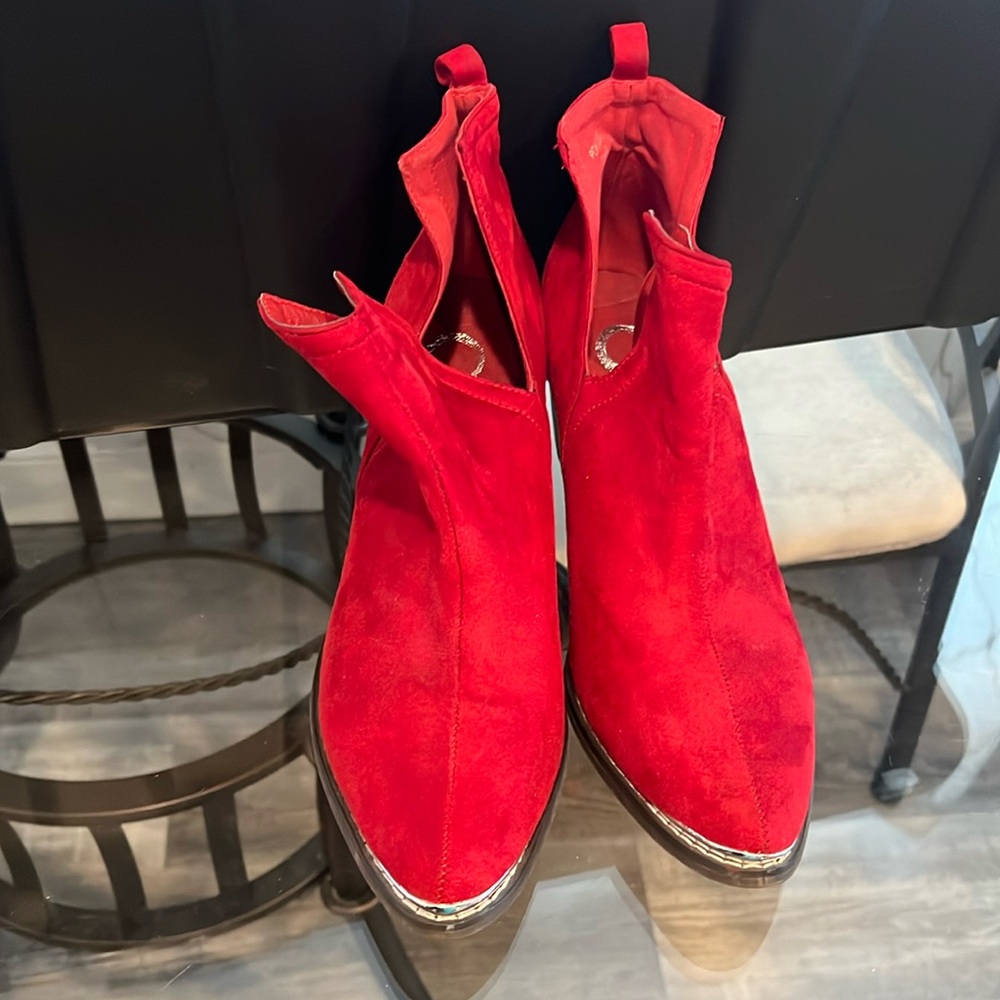 83. Women’s Red Heeled Boots